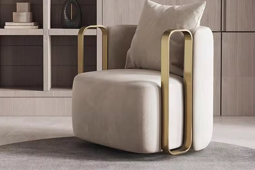 Beige armchair with gold accents