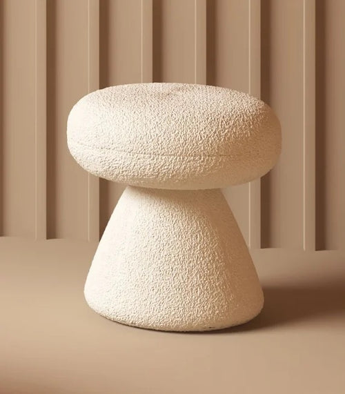 Cream pouf stool with minimalist conical base