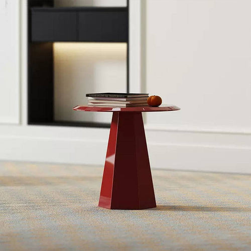 Red accent table in modern room