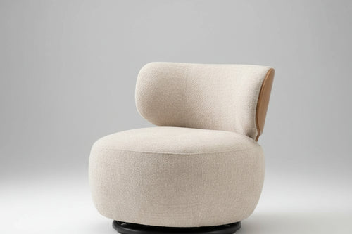 Discover the Konad Chair – a modern swivel accent chair with plush curves, elegant form, and 360° functionality. Perfect for luxury living spaces.The perfect luxury accent chair online in India.