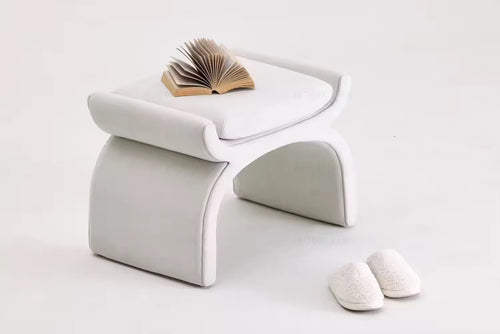 Sculptural cotton pouf with a modern design