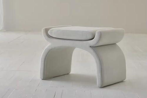 Cotton pouf with a modern infinity loop design