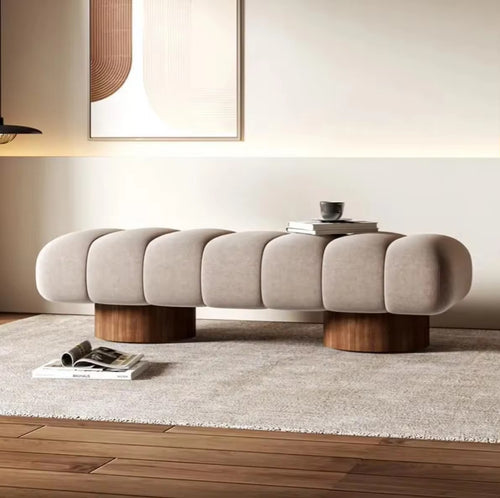 Modern Arco Ottoman with rounded segments and wood legs