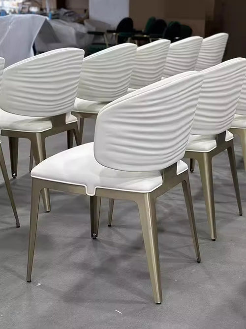 Modern dining setup with multiple Onyx Dining Chairs