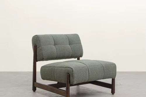 Velin Luxury Accent Chair online by chair collective is a geometric chair in teak wood with soft and plush cushioning