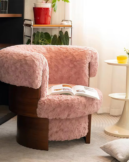 Discover the Ackor Chair — a luxurious swivel accent chair featuring soft fur upholstery and a rich veneer frame. Perfect for modern homes and stylish interiors. Luxury Accent Chairs Online by Chair Collective