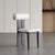 Side look of modern chair with white seat 