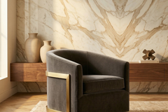 Gray armchair with gold accents and swivel mechanism