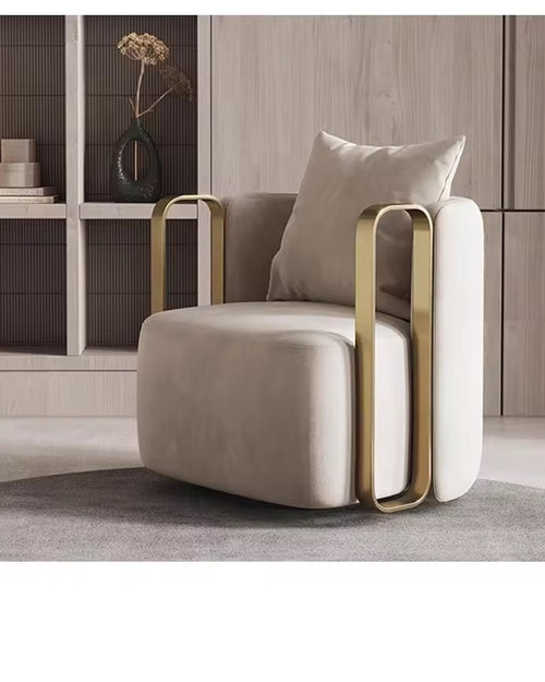 Beige armchair with gold accents 