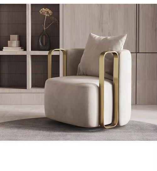 Beige armchair with gold accents 