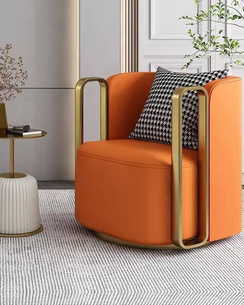 Orange armchair with gold frame