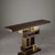 Modern console with gold geometric base