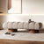 Beige Ottoman with cylindrical wooden legs
