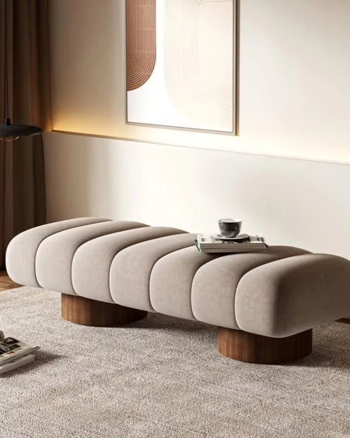 Side angle of Ottoman showing plush pillowed segments.