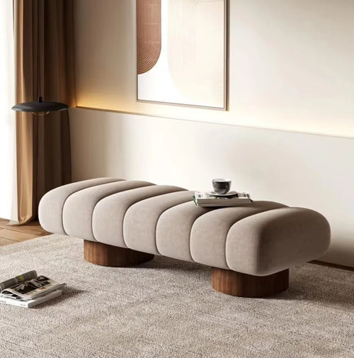 Side angle of Ottoman showing plush pillowed segments.