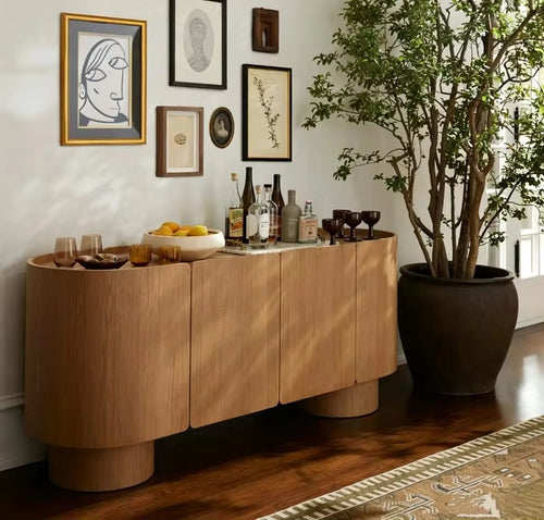 Contemporary storage console crafted in white ash veneer, featuring rounded edges, concealed storage, and a warm sculptural design for luxury interiors.