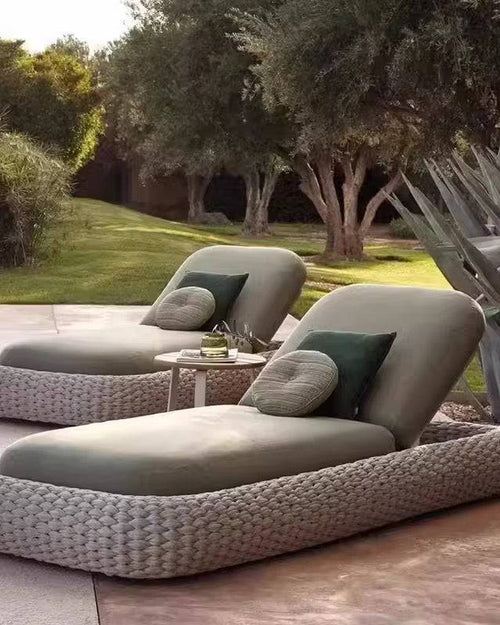 Two modern outdoor lounge chairs 