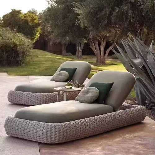 Two modern outdoor lounge chairs 