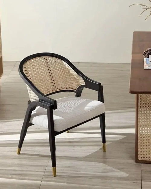 Stylish rattan chair with a teak frame 