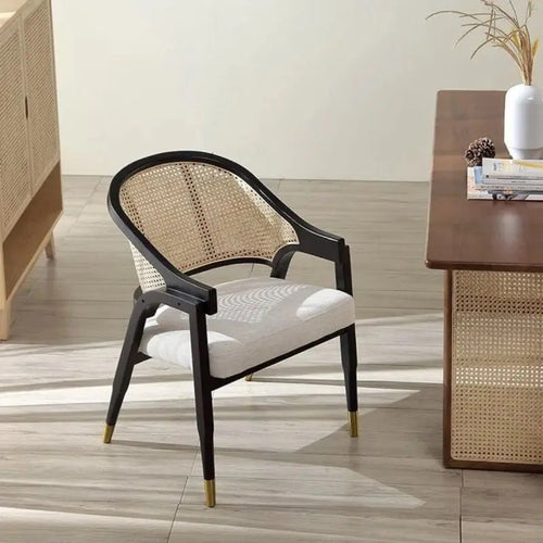 Stylish rattan chair with a teak frame 
