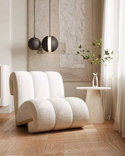 Close-up of the soft, textured boucle fabric on chair