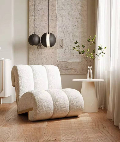 Close-up of the soft, textured boucle fabric on chair