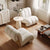 Two white armchairs in modern living room 
