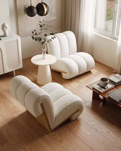 Two white armchairs in modern living room 