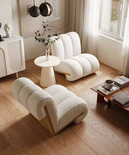 Two white armchairs in modern living room 