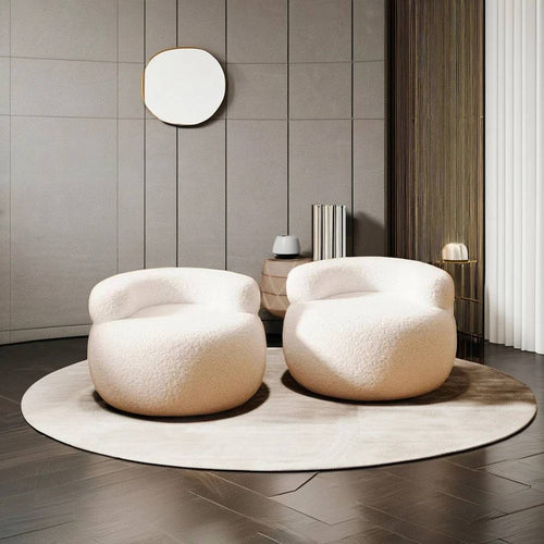 Two Brady chairs in white, with a round shape 