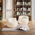 Pair of white Brady Chairs arranged in a cozy library-style room 
