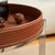 Closeup view of  brown Brian Tray Trolley
