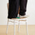 White Bubbles Stackable Chair demonstrating its strength and durability