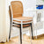 Stack of white and black Bubbles Stackable Chairs