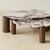 Calcita Coffee Table is a luxury set of 2 Calacatta marble cocktail tables with metallic gold pillar legs, perfect for modern living rooms and statement interiors.