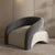 Gray designer Camry chair with sleek armrest and low base