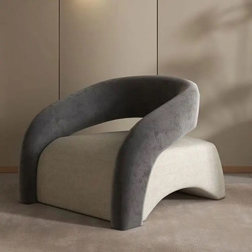 Gray designer Camry chair with sleek armrest and low base