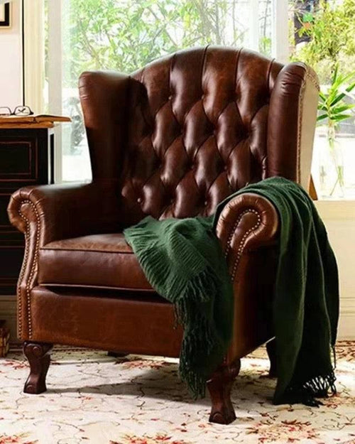 Brown Chester Chair with classic quilting and button detailing