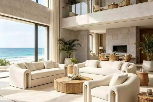 Julius Sofa by Chair Collective featuring a refined upholstered silhouette, gently rounded edges, comfortable seating, and elegant metallic accent details.