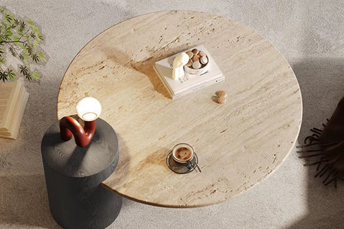 Shop the Copenhagen Boho Coffee Table by Chair Collective — a luxury Japandi Wabi-Sabi design featuring a travertine marble top and teak base. Available in natural and black finishes. Perfect for modern luxury homes in India.