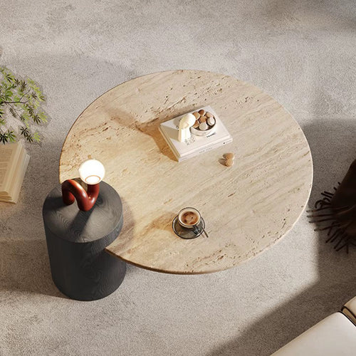 Shop the Copenhagen Boho Coffee Table by Chair Collective — a luxury Japandi Wabi-Sabi design featuring a travertine marble top and teak base. Available in natural and black finishes. Perfect for modern luxury homes in India.