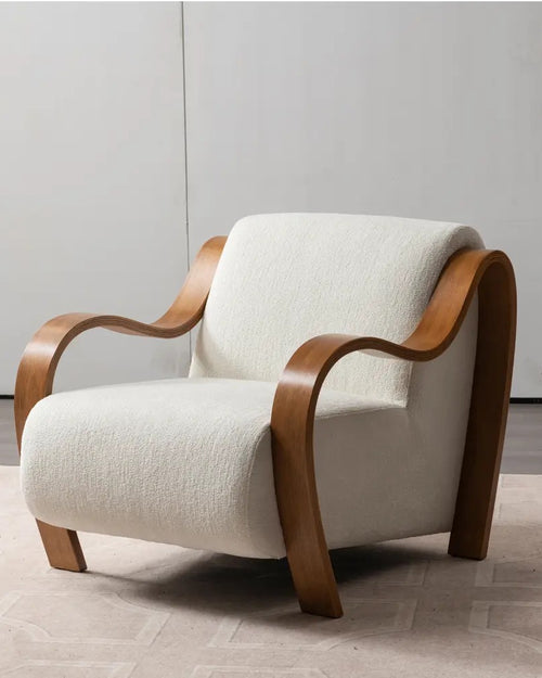 Corby chair featuring graceful curved wooden arms