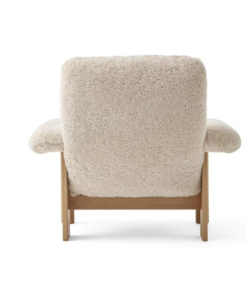 Beige modern armchair back profile