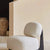 Side profile of armless lounge chair