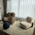 Dally Armless Lounge Chair from different angles and in various settings