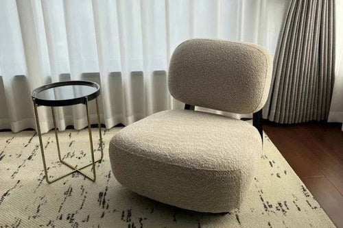 Dally Low-Profile Accent Chair in an off-white fabric