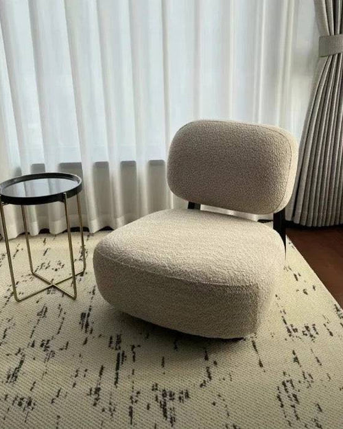 Dally Low-Profile Accent Chair in an off-white fabric