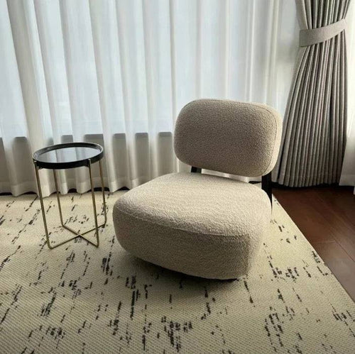 Dally Low-Profile Accent Chair in an off-white fabric