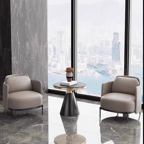 Dennis Royal armchairs in a modern interior setting