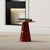 Red accent table in modern room